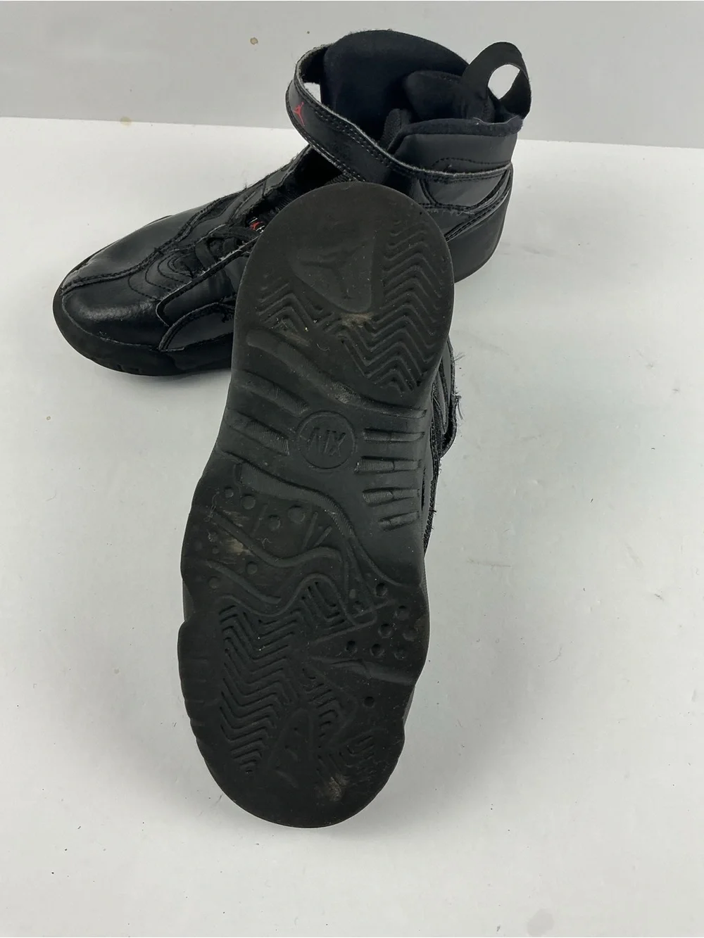 Jordan Black Kids' High-Top Sneakers with Red Jumpman Accents they need inserts